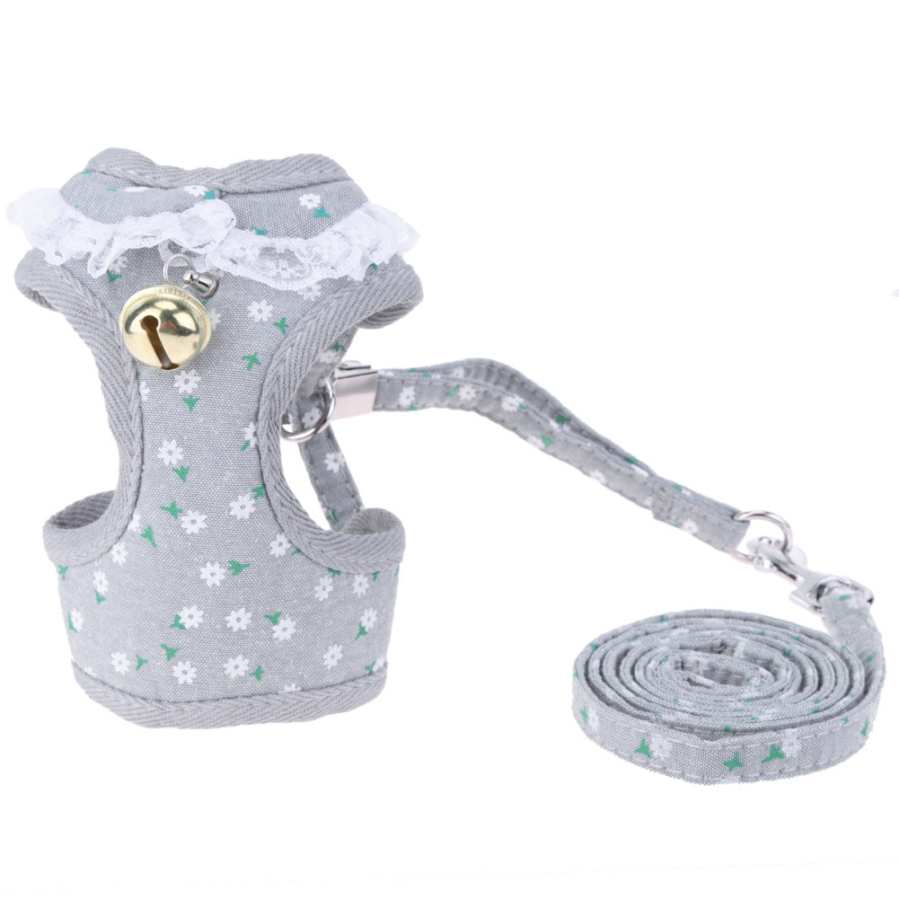 Gray floral-patterned dog harness and leash set on a white background