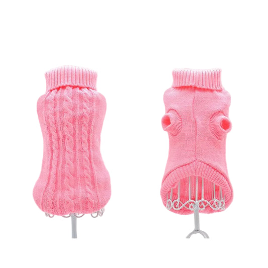 Two pink dog sweaters on mannequins against a white background