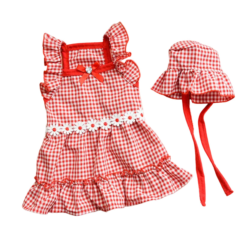 Red and white checkered dress with matching headband on a beige surface