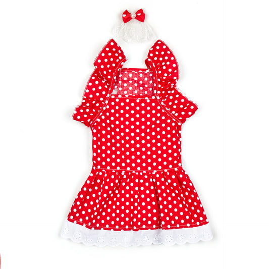 Red polka dot dress with white trim on a white background