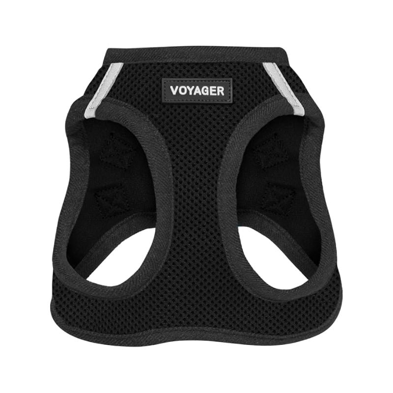 A black dog harness with a breathable mesh pattern, featuring a central brand label that reads 'VOYAGER' and reflective silver stripes on the upper sides, set against a plain white background.